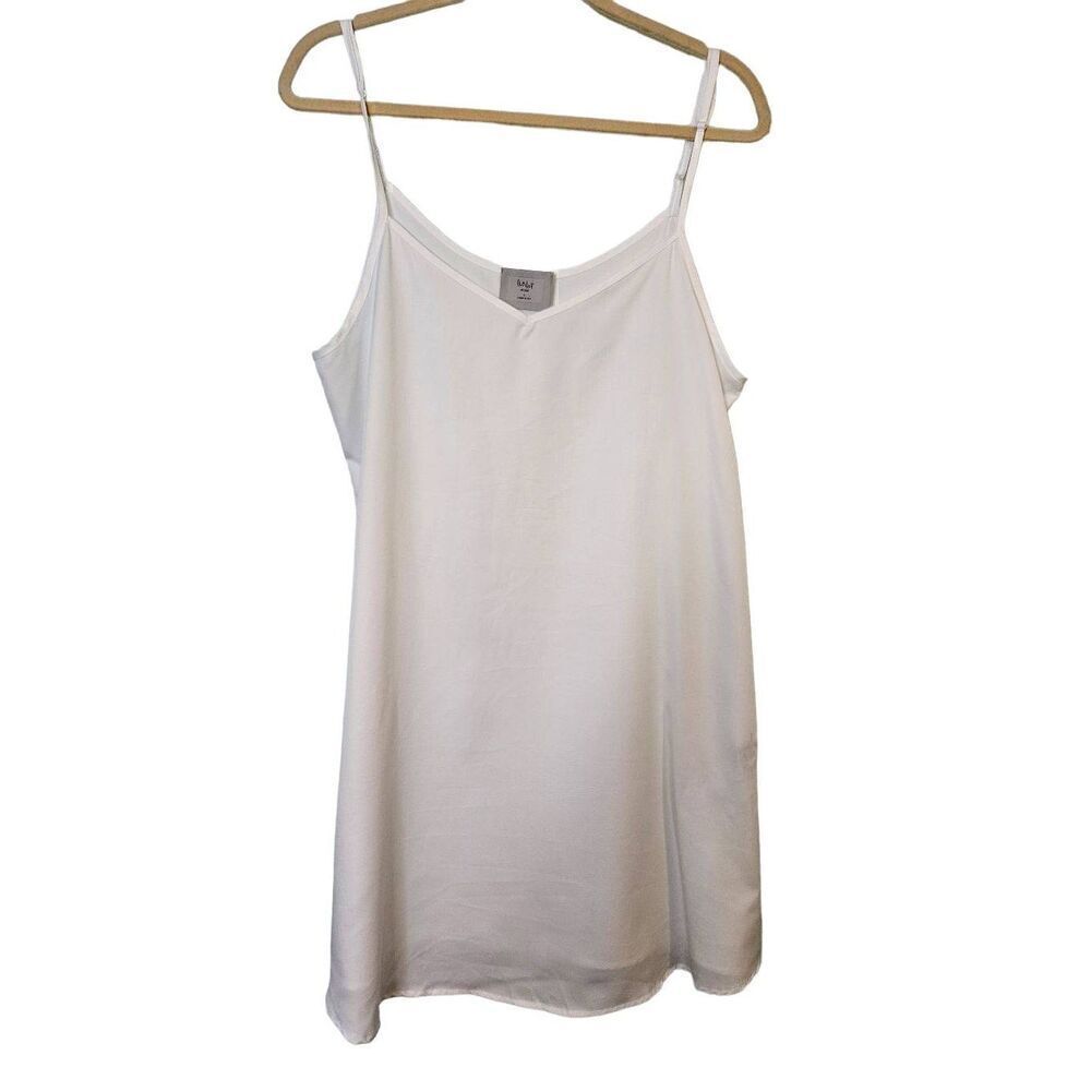Chalet white long tank slip style top. M/L.